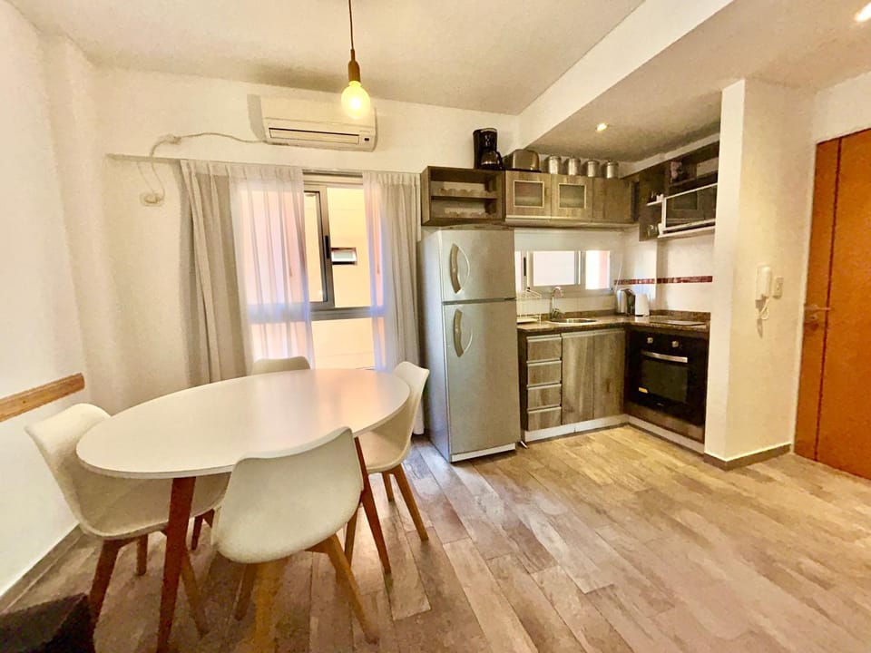 Kitchen or kitchenette, Dining area, oven, stove, air conditioner