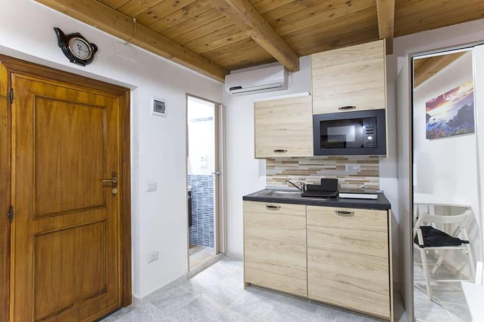 Kitchen or kitchenette, stove