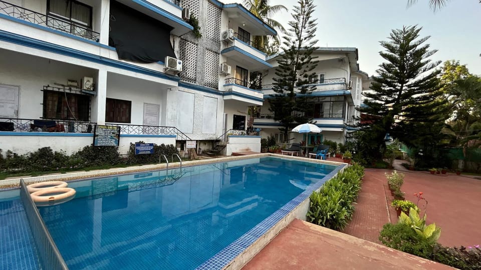 Property building, Patio, Day, Garden, View (from property/room), Balcony/Terrace, Garden view, Pool view, Swimming pool