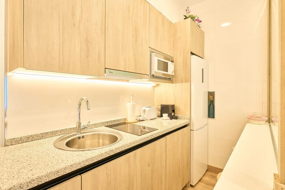 Kitchen or kitchenette, stove