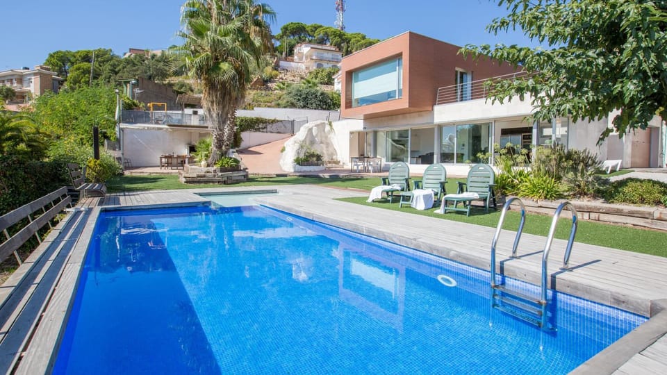 Property building, Living room, Swimming pool