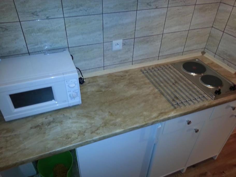 Kitchen or kitchenette, stove
