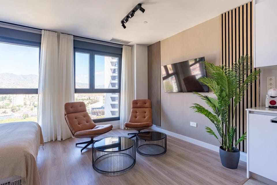 TV and multimedia, Kitchen or kitchenette, Living room, Seating area, Dining area, air conditioner