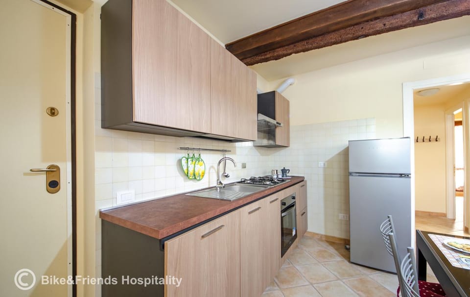 Kitchen or kitchenette, oven, stove