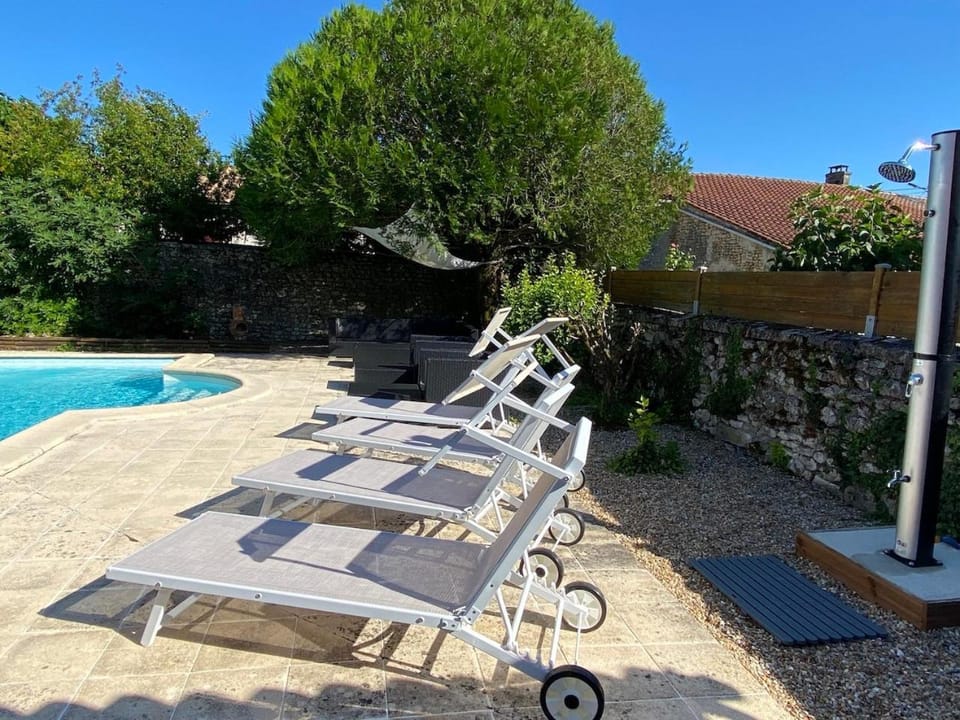 Swimming pool, sunbed