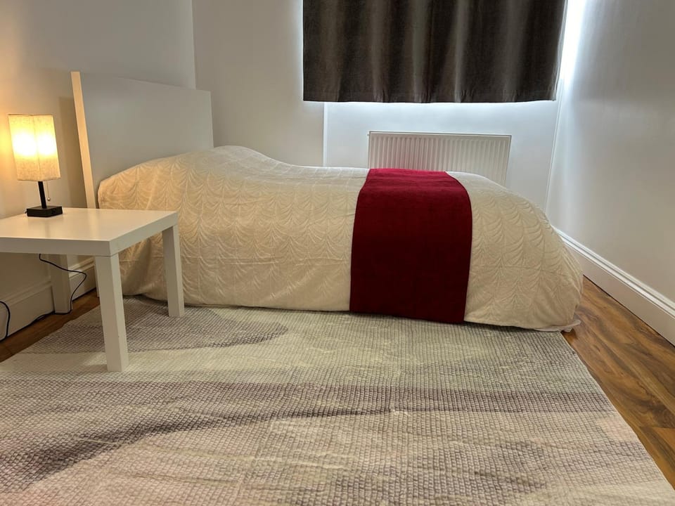 Bed, Seating area, Bedroom, towels, wardrobe