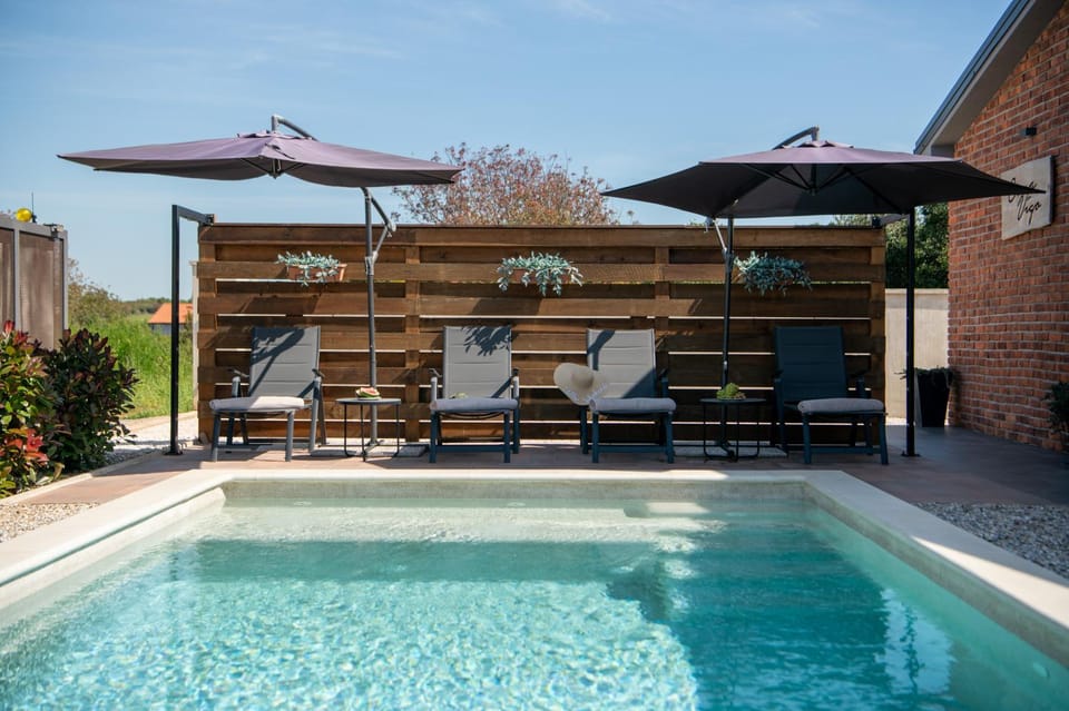 Patio, Day, Pool view, Swimming pool, sunbed
