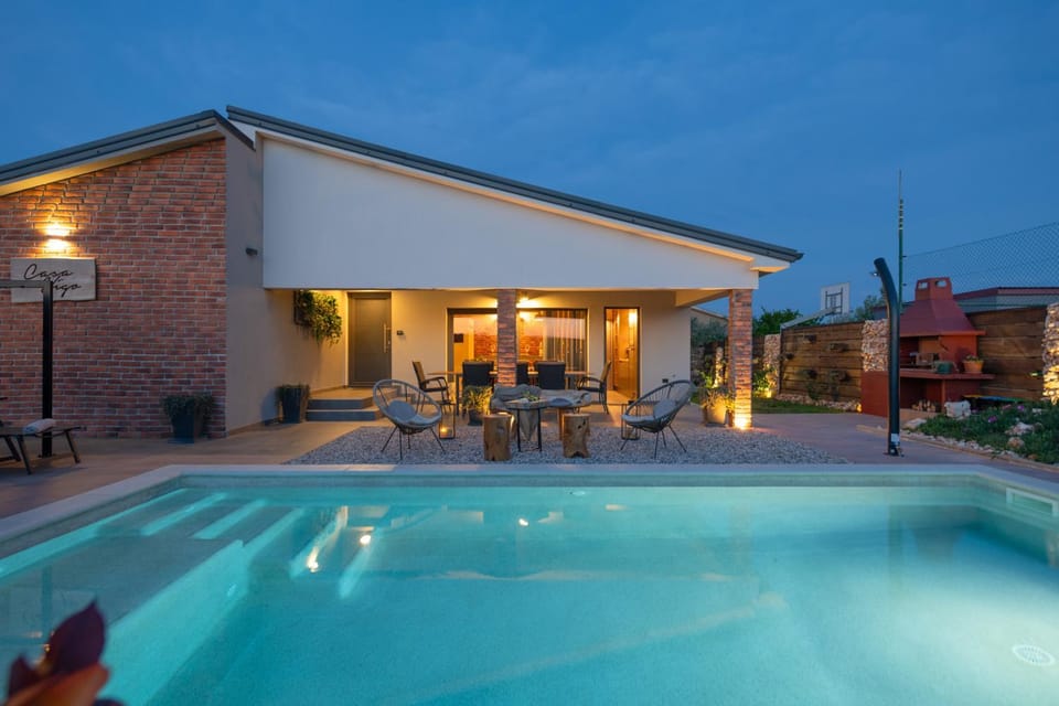 Property building, Patio, Night, Pool view, Swimming pool, sunbed
