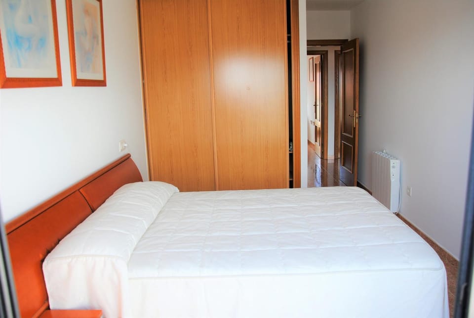 Bed, wardrobe