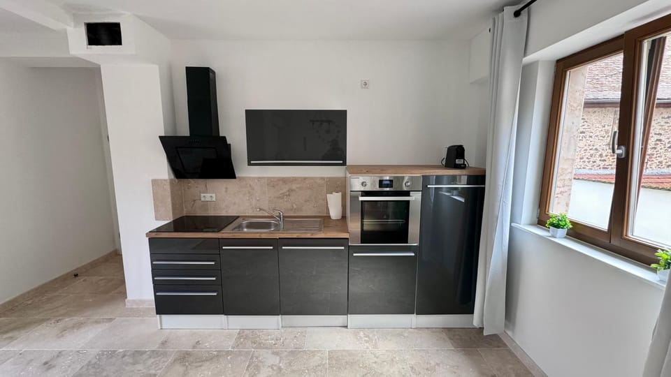 Kitchen or kitchenette, oven, stove