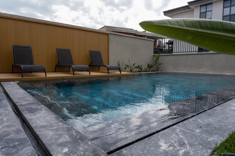 Swimming pool, sunbed