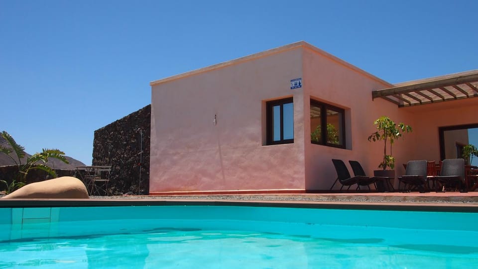 Property building, Patio, Day, Aqua park, Pool view, Swimming pool