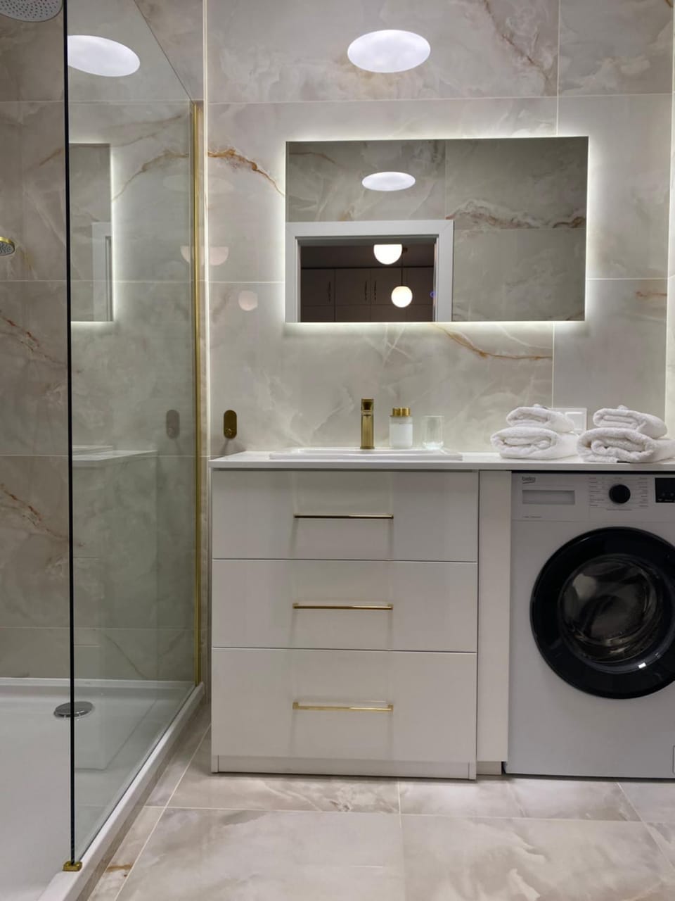 Shower, Bathroom, towels, washing machine, dryer