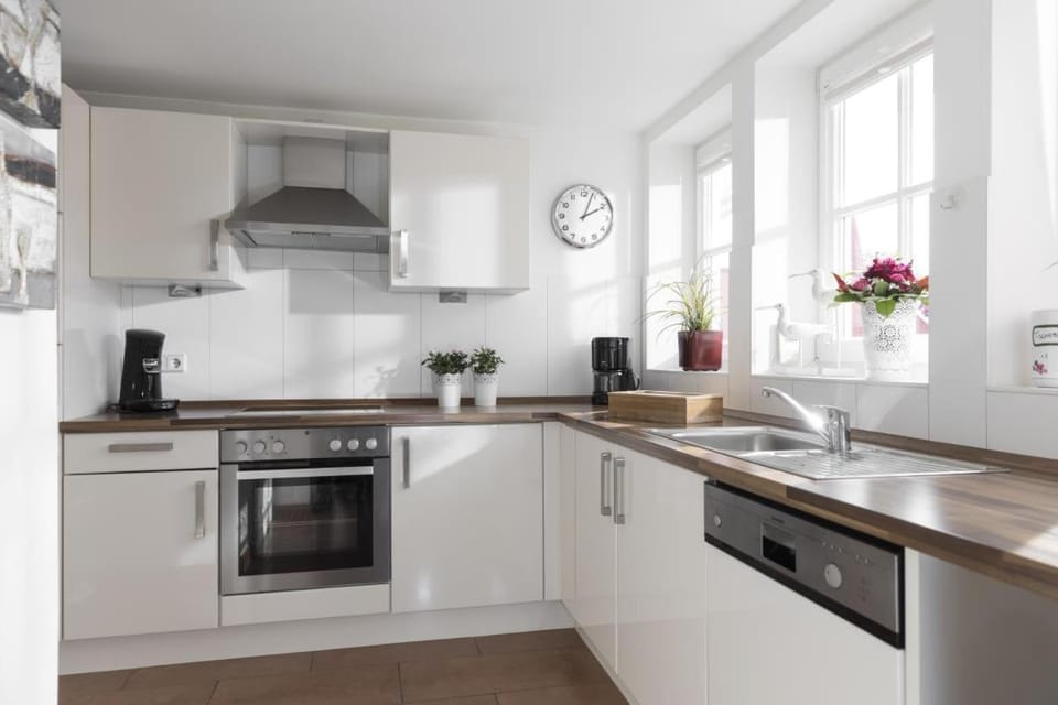 Schwalbennest Greetsiel für bis zu 6 Personen mit Kaminofen, Whirlpool und Sauna - Haustiere herzlich willkommen, nah am Hafen Apartment in Norden