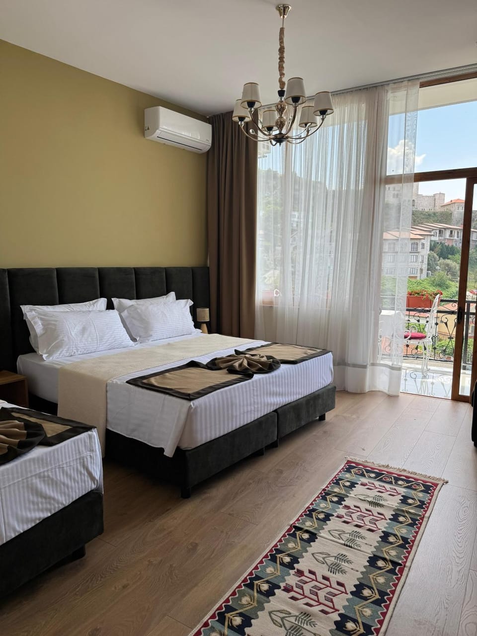 Bed, Photo of the whole room, Bedroom, towels, air conditioner