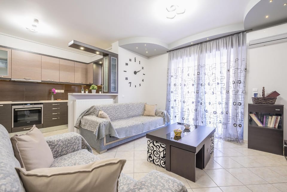 Kitchen or kitchenette, Living room, Seating area, oven, stove, air conditioner