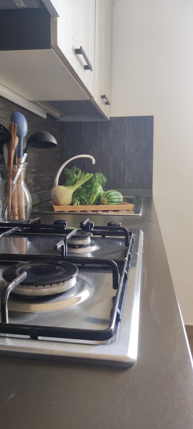 Kitchen or kitchenette, stove