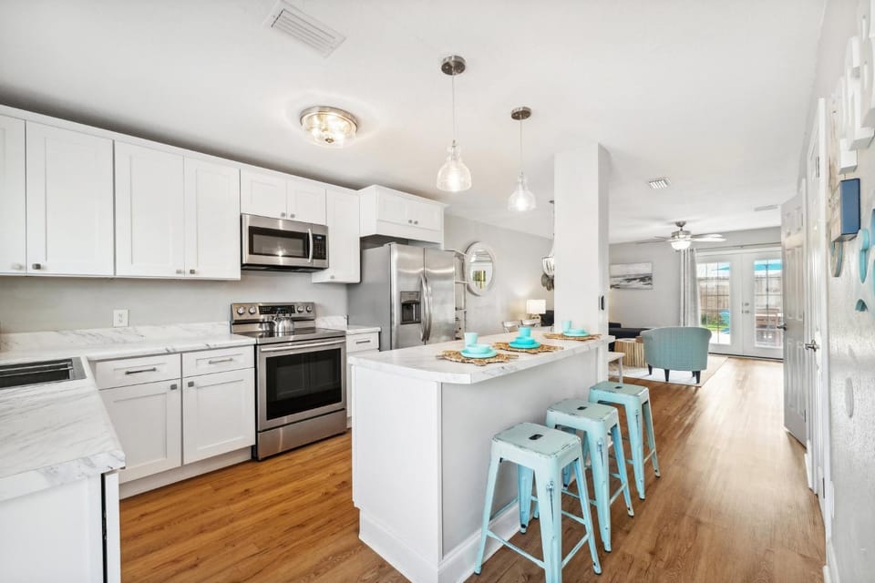 Kitchen or kitchenette, dishwasher, oven, stove, toaster