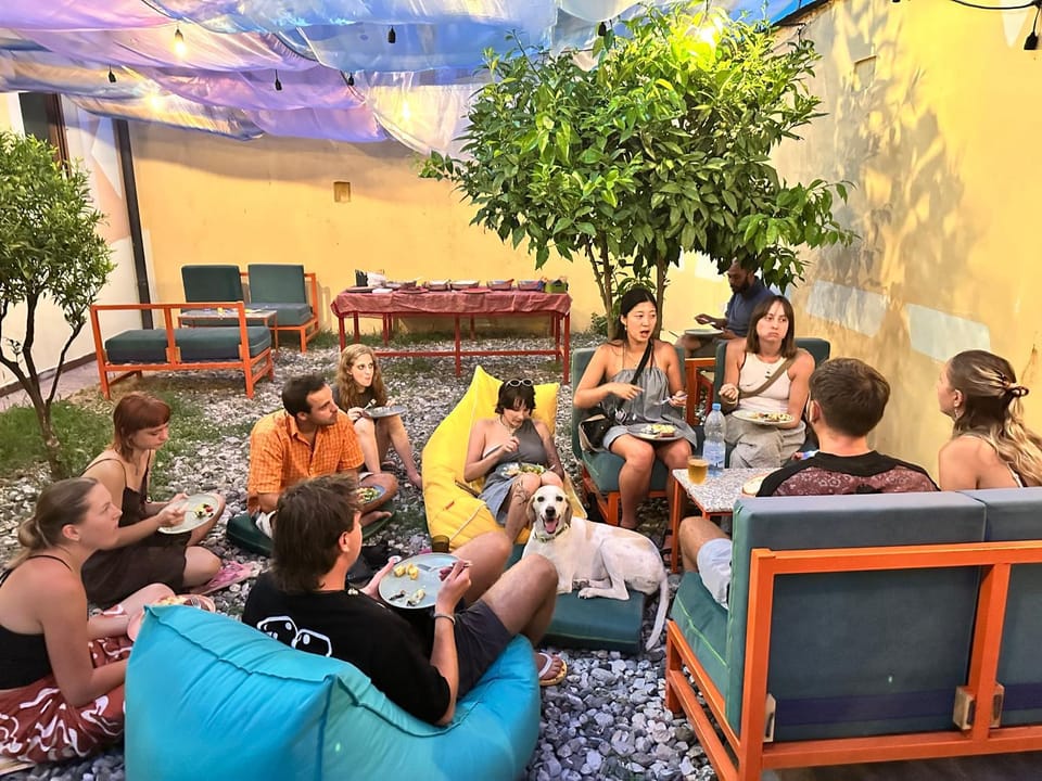 Property building, Patio, Day, People, Seating area, Food, group of guests