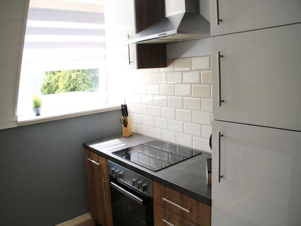Kitchen or kitchenette, stove