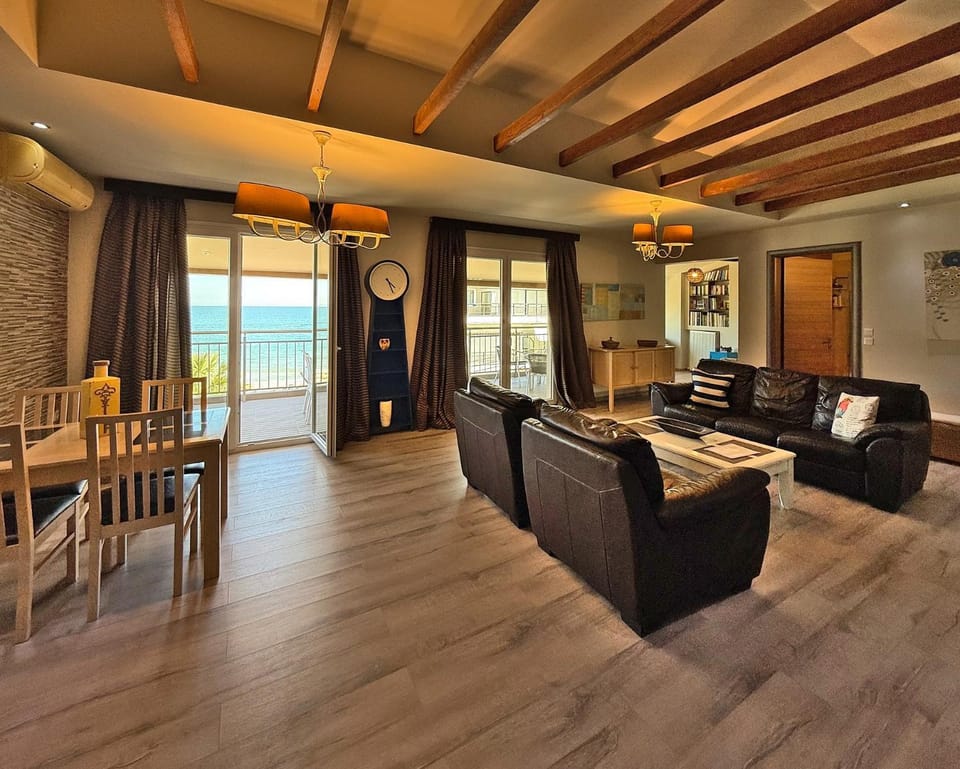 Natural landscape, Living room, Seating area, Dining area, Sea view