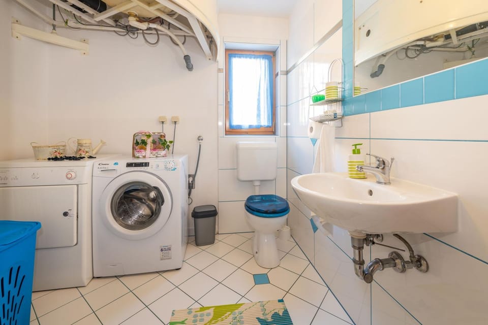 Bathroom, towels, washing machine, dryer