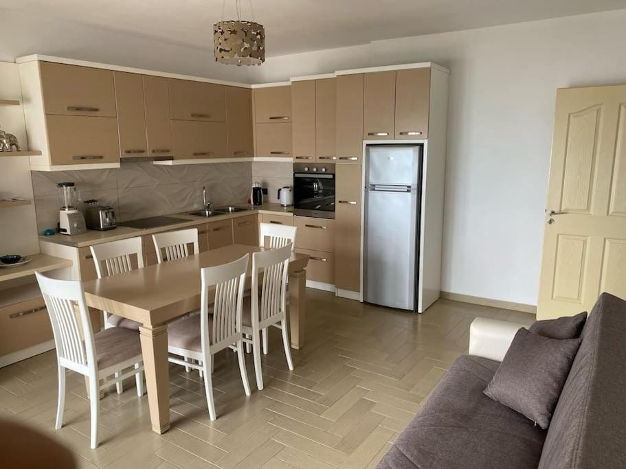 Living room, Dining area, oven, stove, toaster