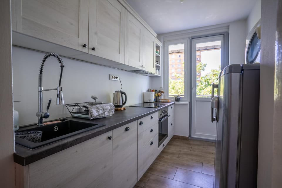Kitchen or kitchenette, oven, stove