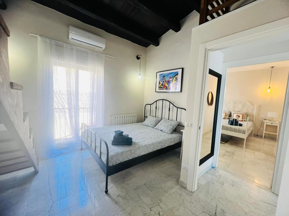 Bed, Photo of the whole room, Bedroom, towels, air conditioner