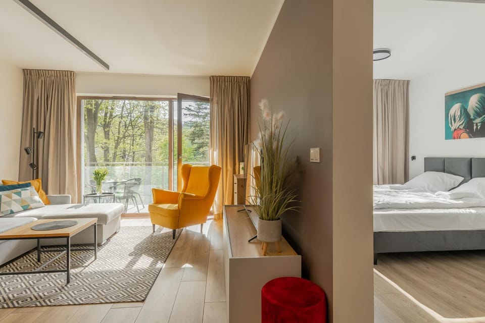 Bed, Living room, Seating area, Bedroom