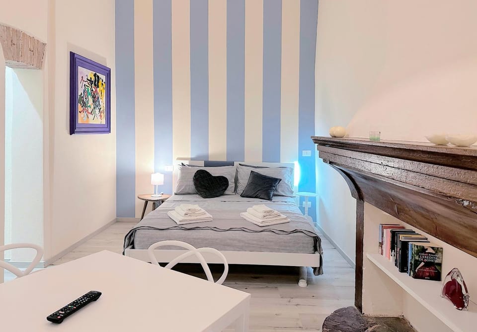 Bed, Photo of the whole room, Bedroom, towels, air conditioner