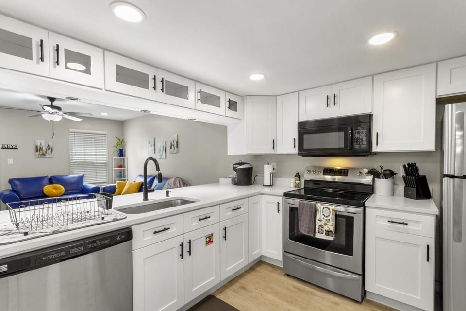 Kitchen or kitchenette, microwave, oven, stove, stove, kitchen