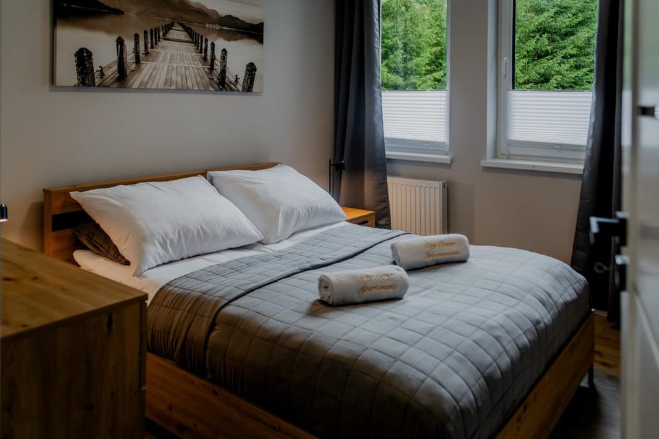 Bed, Day, View (from property/room), Logo/Certificate/Sign, Bedroom, towels