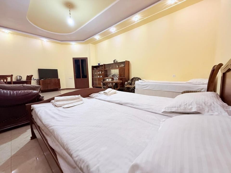 Bed, Photo of the whole room, Bedroom, towels, air conditioner
