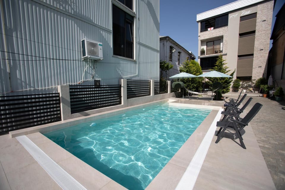 Swimming pool, sunbed