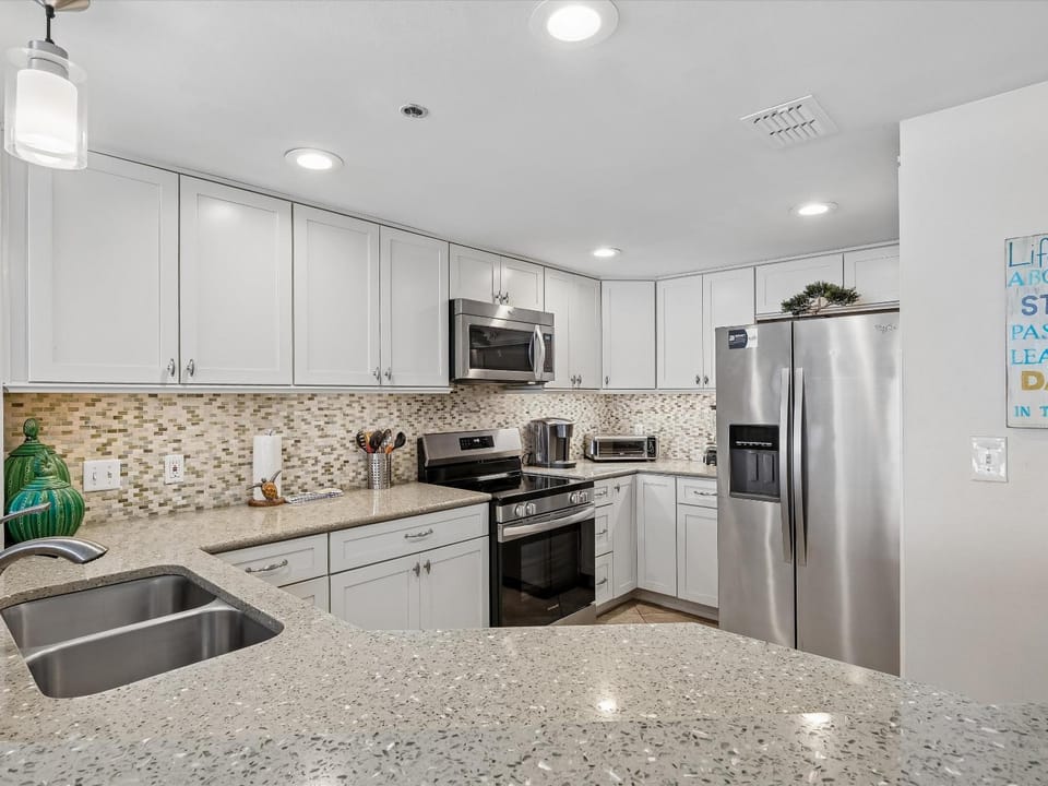 Kitchen or kitchenette, microwave, oven, stove, toaster, kitchen