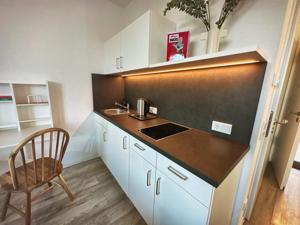 Kitchen or kitchenette, stove