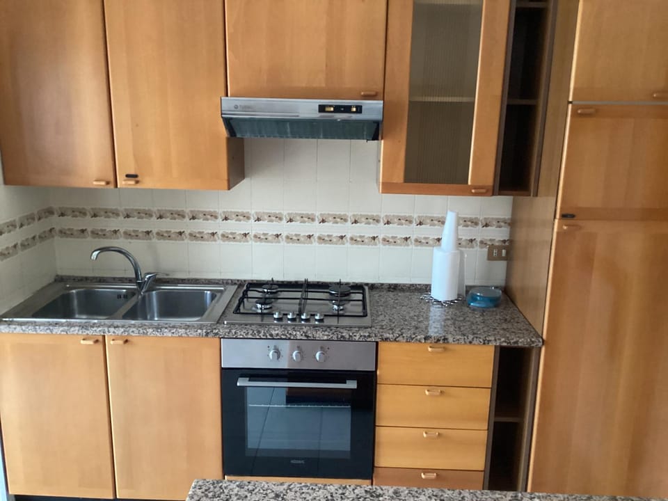 Kitchen or kitchenette, oven, stove