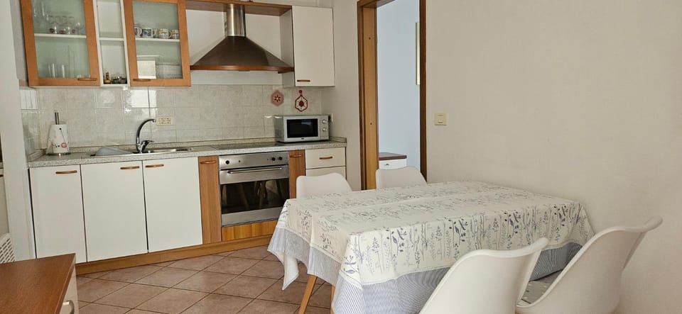 Kitchen or kitchenette, microwave, stove, kitchen