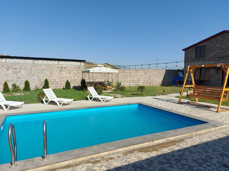 Swimming pool, sunbed