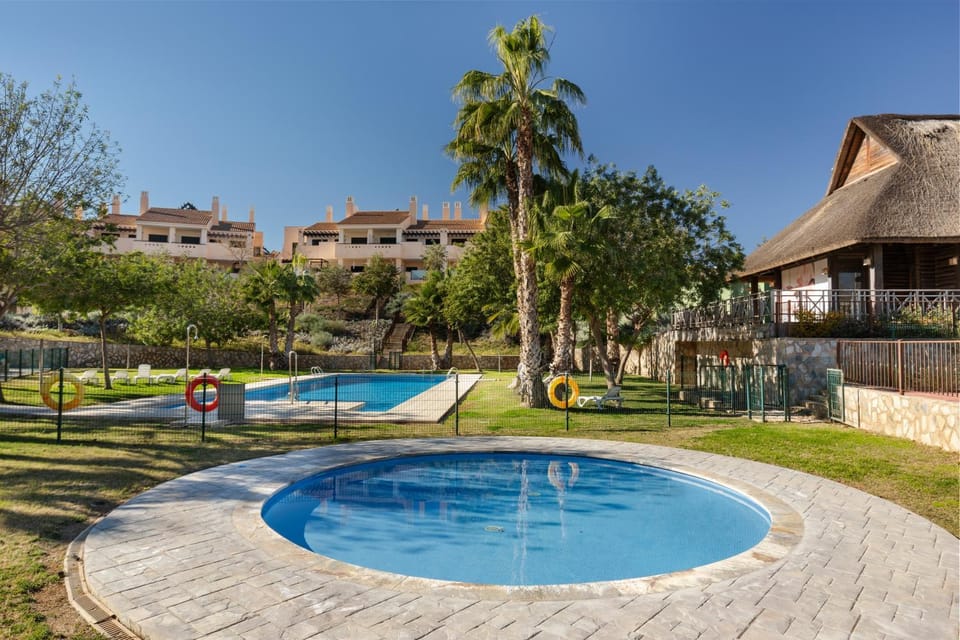 Property building, Living room, Swimming pool