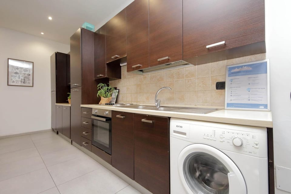 Kitchen or kitchenette, washing machine