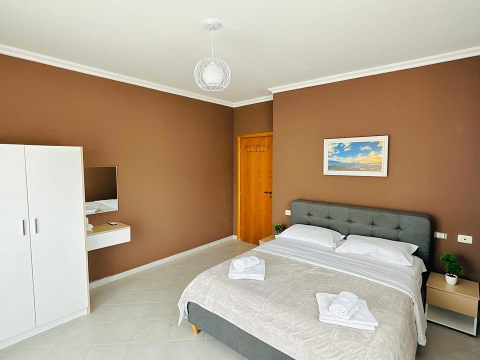 Bed, Bedroom, towels, wardrobe, air conditioner