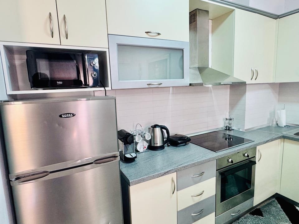 Kitchen or kitchenette, oven, stove, toaster