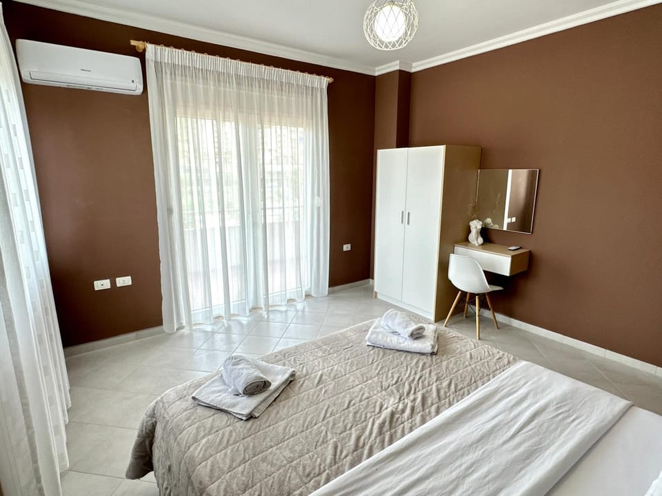 Bed, Bedroom, towels, wardrobe, air conditioner