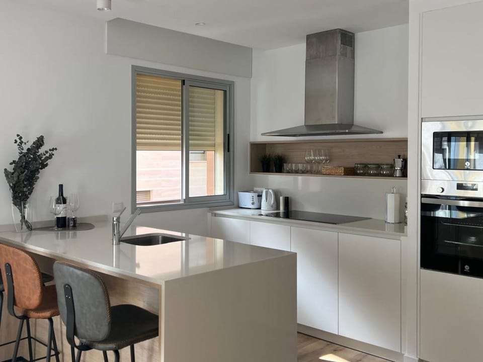 Kitchen or kitchenette, oven, stove