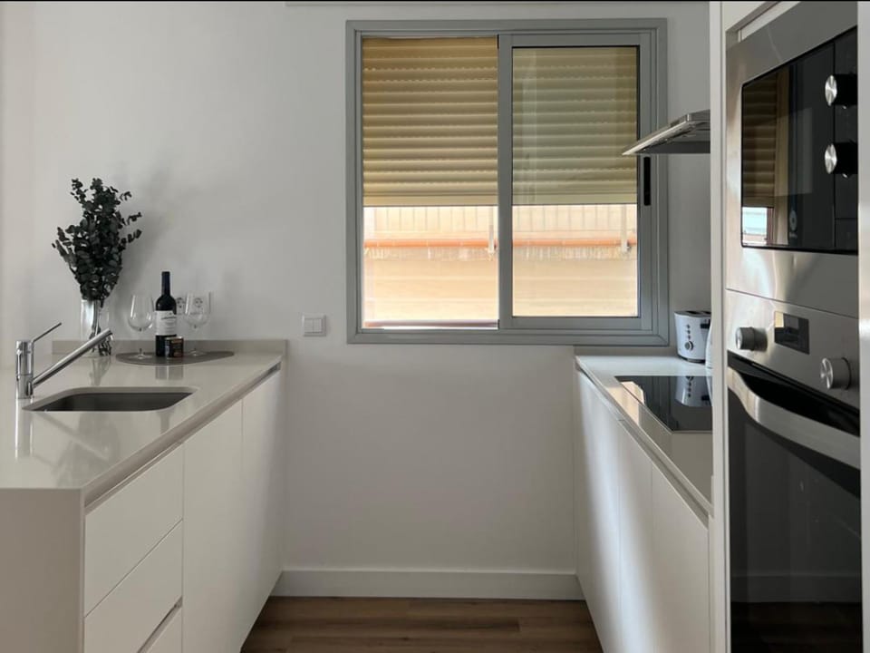 Kitchen or kitchenette, oven, stove