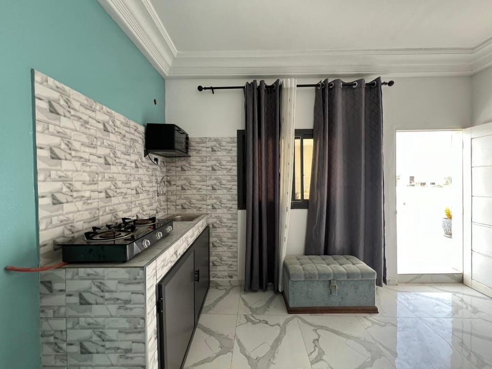 Kitchen or kitchenette, microwave