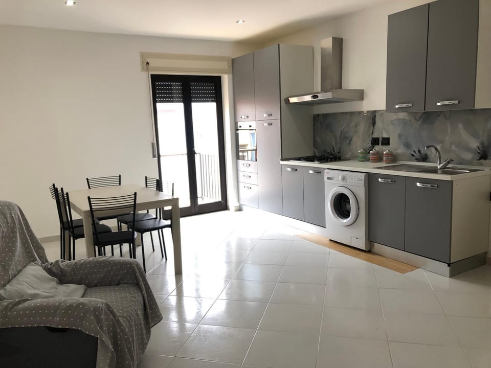 Living room, Dining area, oven, stove, washing machine