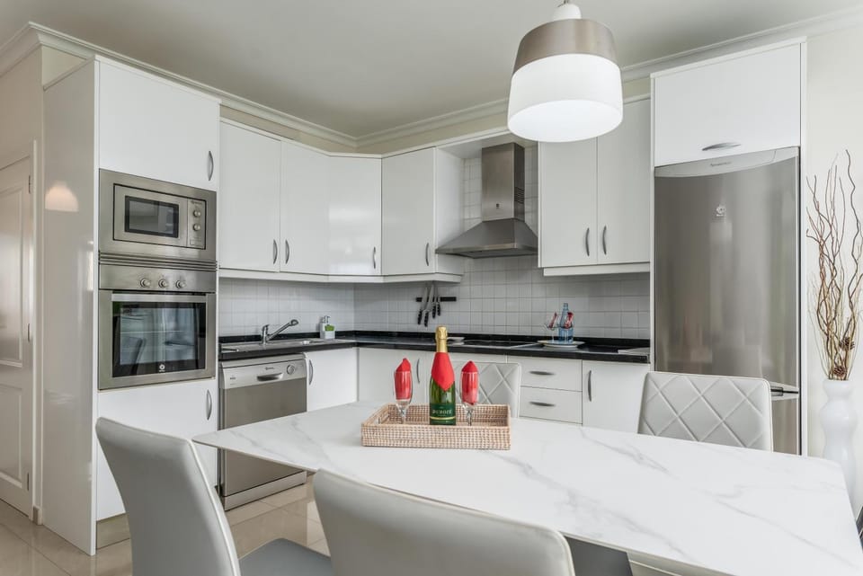 Kitchen or kitchenette, Dining area, dishwasher, stove, toaster